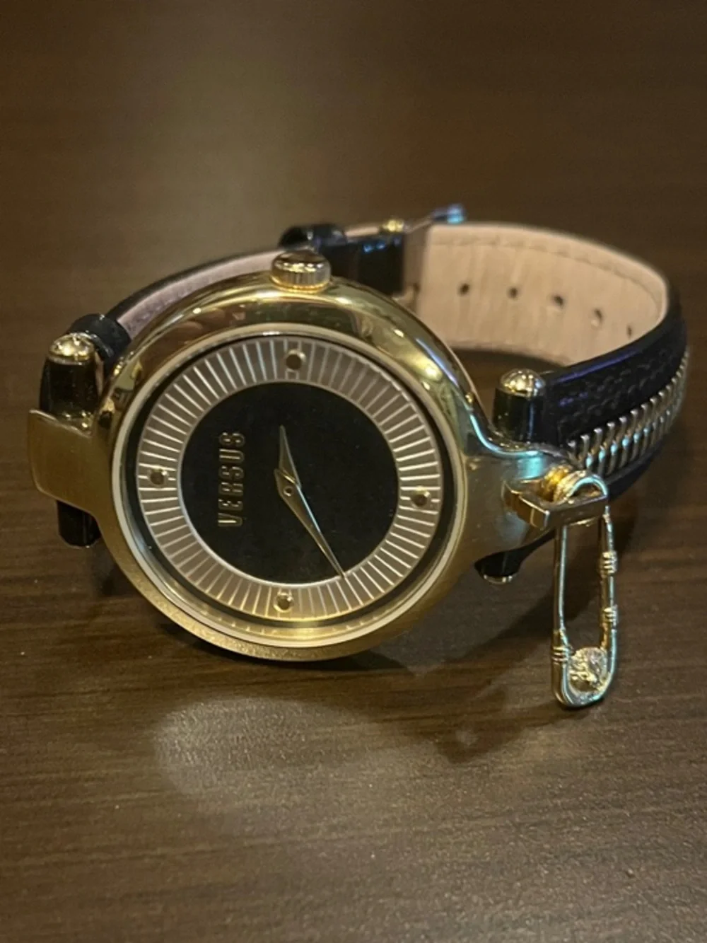 Versus Versace Black and Gold Women's Round Dial Watch with Charm Accent